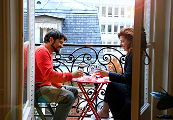 Couple on Paris balcony