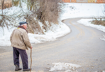 elderly man in snow